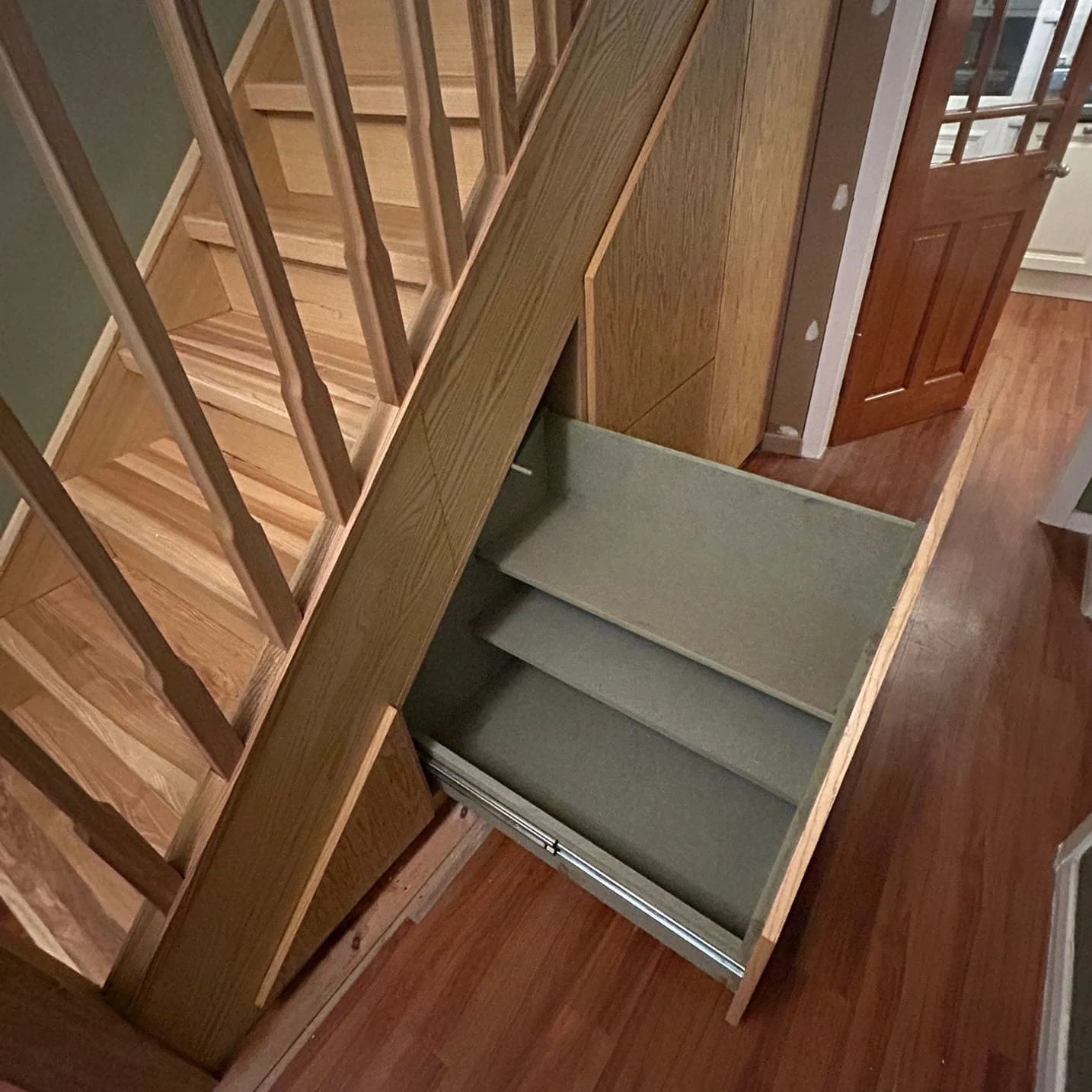 Staircase with fitted understair storage